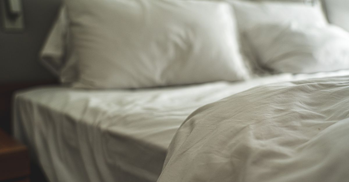 Natural organic bedding in a bright bedroom